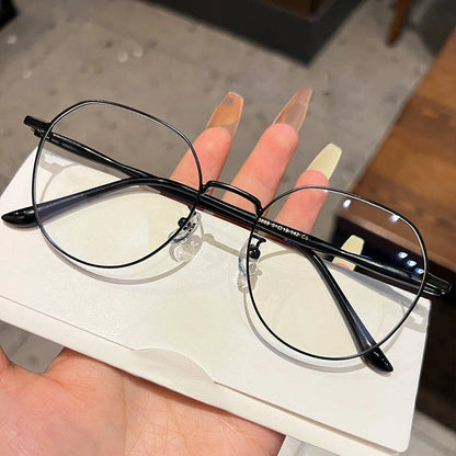 Clear Glasses for Women: Polygonal Metal Frame Eyeglasses with Flat Mirror Lenses, Designed for Girls, Featuring Anti-Blue Light Technology and Fashionable Eyewear Aesthetics.