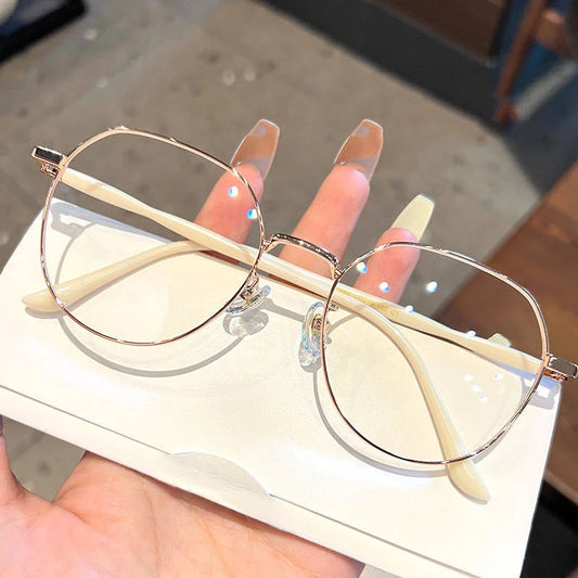 Clear Glasses for Women: Polygonal Metal Frame Eyeglasses with Flat Mirror Lenses, Designed for Girls, Featuring Anti-Blue Light Technology and Fashionable Eyewear Aesthetics.