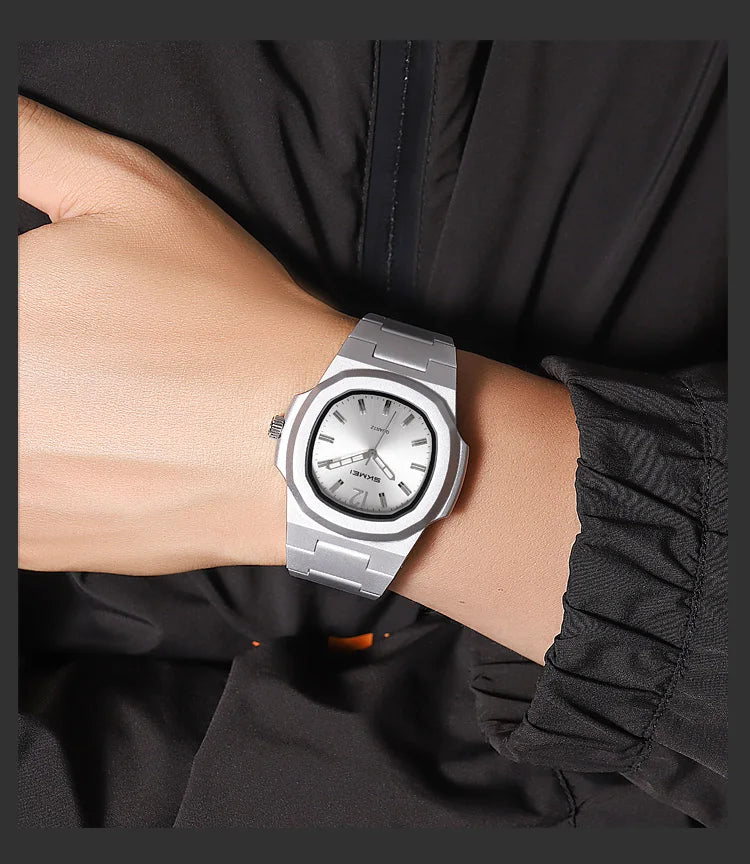 This elegant timepiece offers a sophisticated aesthetic, perfect for any occasion. Its analog display provides a classic and timeless look. Furthermore, the 50M water resistance ensures durability and practicality for everyday wear. The simple yet refined