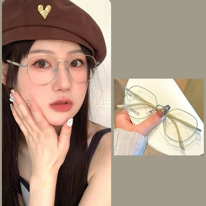 Clear Glasses for Women: Polygonal Metal Frame Eyeglasses with Flat Mirror Lenses, Designed for Girls, Featuring Anti-Blue Light Technology and Fashionable Eyewear Aesthetics.
