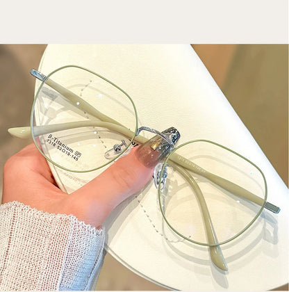 Clear Glasses for Women: Polygonal Metal Frame Eyeglasses with Flat Mirror Lenses, Designed for Girls, Featuring Anti-Blue Light Technology and Fashionable Eyewear Aesthetics.
