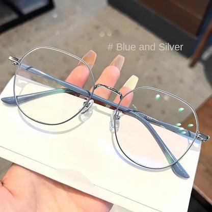 Clear Glasses for Women: Polygonal Metal Frame Eyeglasses with Flat Mirror Lenses, Designed for Girls, Featuring Anti-Blue Light Technology and Fashionable Eyewear Aesthetics.