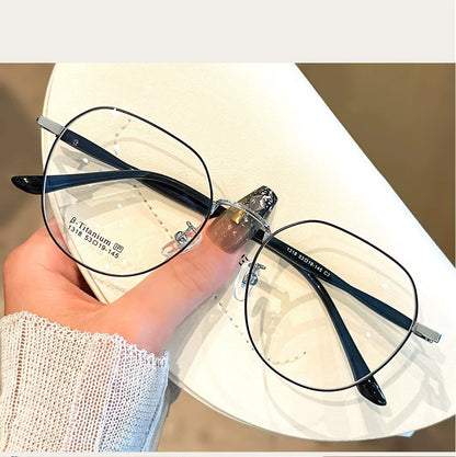 Clear Glasses for Women: Polygonal Metal Frame Eyeglasses with Flat Mirror Lenses, Designed for Girls, Featuring Anti-Blue Light Technology and Fashionable Eyewear Aesthetics.