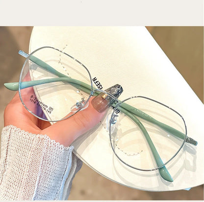 Clear Glasses for Women: Polygonal Metal Frame Eyeglasses with Flat Mirror Lenses, Designed for Girls, Featuring Anti-Blue Light Technology and Fashionable Eyewear Aesthetics.